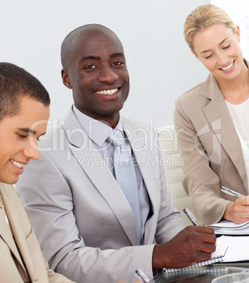 Business People Smiling in a meeting