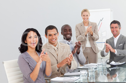 Business people at a presentation Clapping