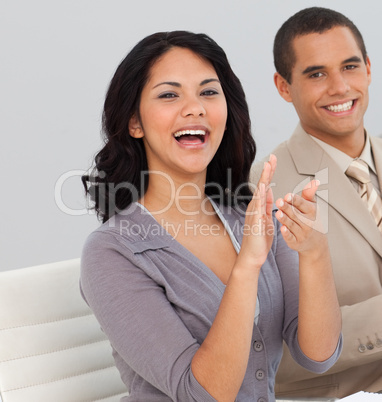 Business people at a presentation Clapping