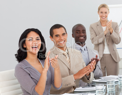 Business people at a presentation Clapping