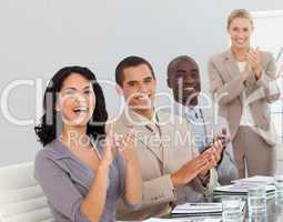 Business people at a presentation Clapping