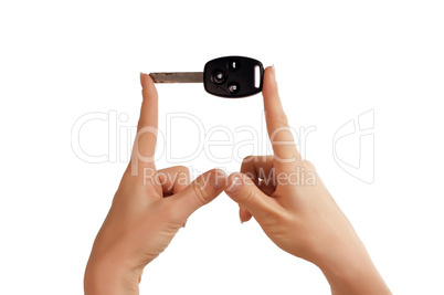 hand with car key