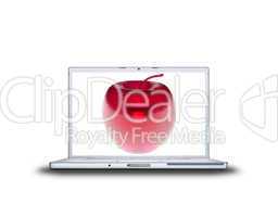 3D red glass apple on laptop