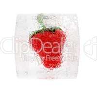 Strawberry frozen in ice cube isolated on white