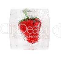 Strawberry frozen in ice cube isolated on white