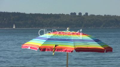 Beach Umbrella And Sailboat