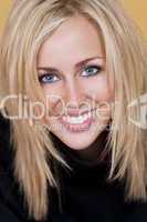 Beautiful Happy Young Blond Woman With Perfect Teeth and Smile