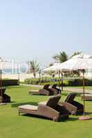 Luxurious hotel  recreation area with modern deck chairs, Dubai,