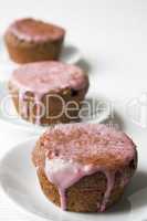 Muffin mit rotem Zuckerguss