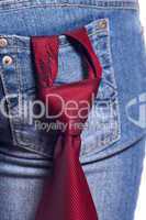 Red tie in a pocket female jeans