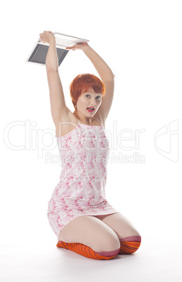 Red Girl in stripe socks  crash laptop on white background