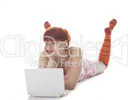 Red Girl in stripe socks  with laptop on white background