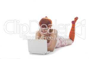 Red Girl in stripe socks  with laptop on white background