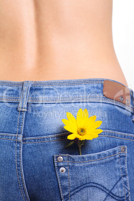 Female jeans with flower in pocket