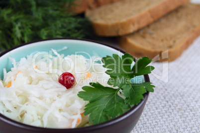 Salad from cabbage with a cowberry and bread