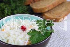 Salad from cabbage with a cowberry and bread