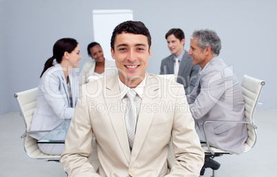 Confident businessman smiling in a meeting