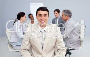 Confident businessman smiling in a meeting
