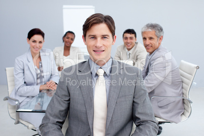 Confident young businessman in a meeting