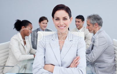 Confident businesswoman smiling in a meeting