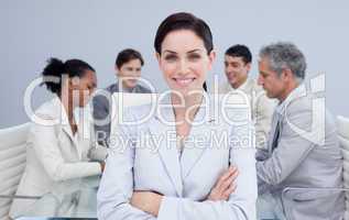 Confident businesswoman smiling in a meeting