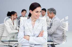 Beautiful businesswoman smiling in a meeting