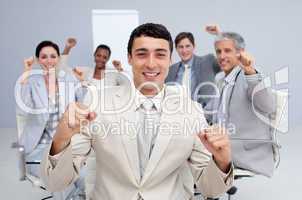 Happy business team celebrating a sucess