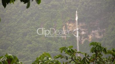 Waterfall on a vertical basalt cliff