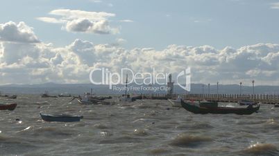 Stormy sea pier boats