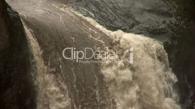 Water pouring off the top of San Rafael Falls, Ecuador