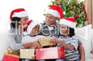 Afro-American family celebrating Christmas at home