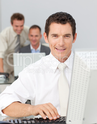 Businessman working with a computer in a company