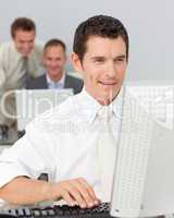 Businessman working with a computer in the office