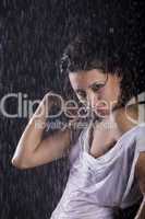 young girl under rain