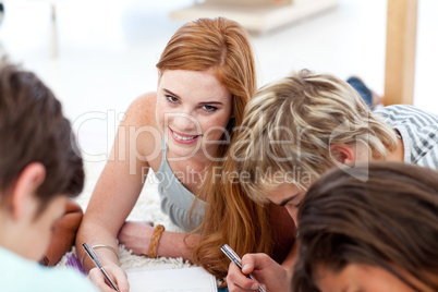 Portrait of a teen girl doing homework