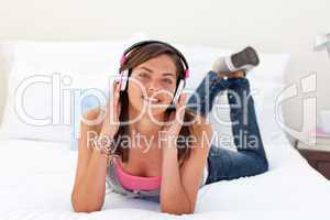 Beautiful teenager listening to the music