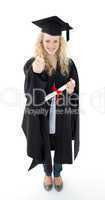 Teenage Girl Celebrating Graduation with thumbs up
