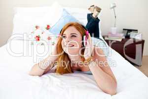 Beautiful teenager listening to the music