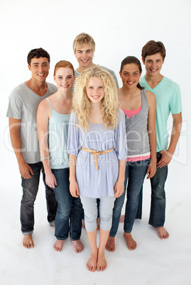 Group of teenagers standing in front of the camera