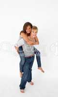 Young boy giving his girlfriend piggyback ride