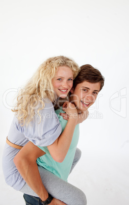 Young boy giving his friend piggyback ride