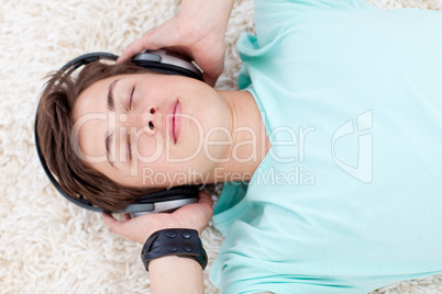 Teen guy listening to music