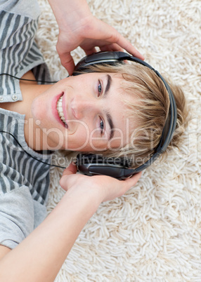 Teen guy listening to music