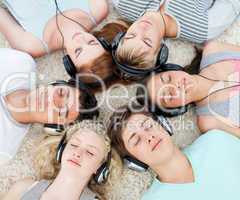 Group of teenagers listening to music