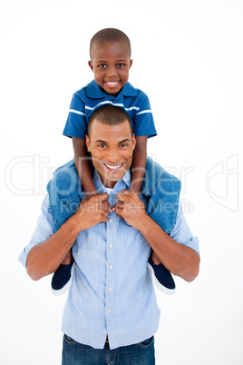Close-up of a father giving son piggyback ride