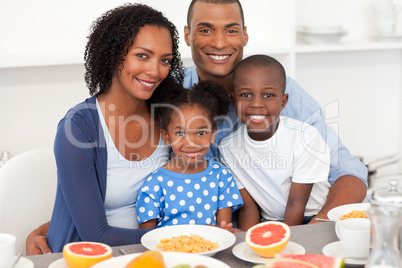 Happy family having healthy breakfast