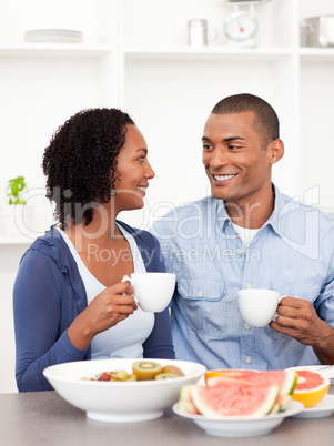 Smiling lovers having healthy breakfast