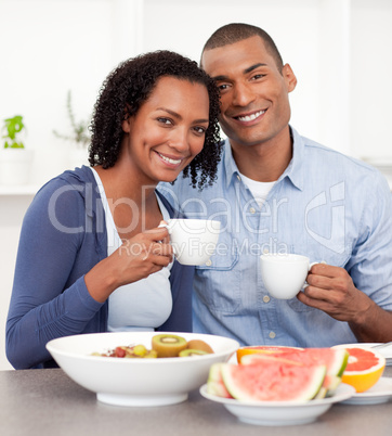 Portrait of an Afro-american couple having breakfast