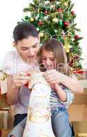 Mother and daughter at home at Christmas time
