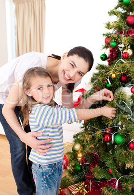 Mother and daughter at home at Christmas time